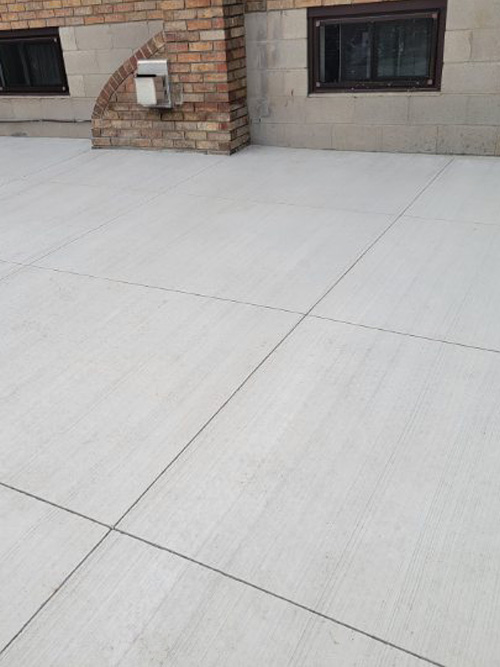 Freshly poured broom finish patio Hamilton ON