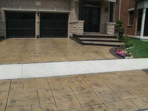 Coloured stamped concrete driveway with border Hamilton ON