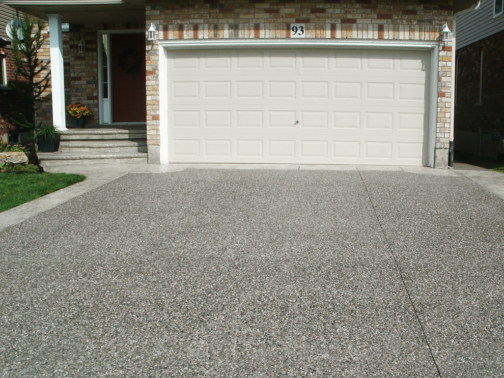 Exposed aggregate driveway with stamped border and steps Hamilton ON