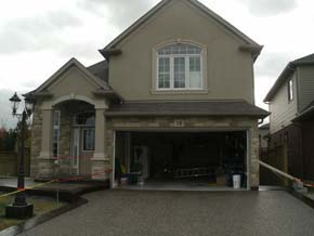 Exposed aggregate driveway, entrance and steps with Border Hamilton ON
