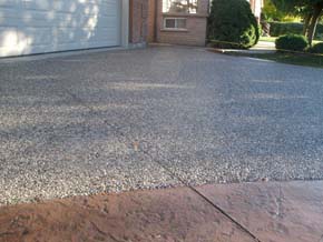 Exposed aggregate driveway with colour stamped concrete border Hamilton ON