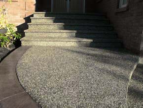 Exposed aggregate extrance and steps with coloured stamped concrete border Hamilton ON