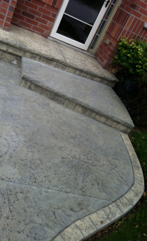 Stamped concrete steps and driveway with border Hamilton ON