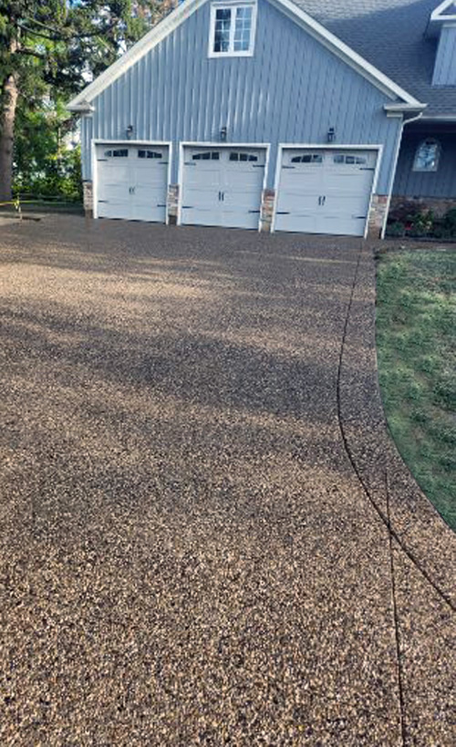 Exposed aggregate driveway with Border Hamilton ON